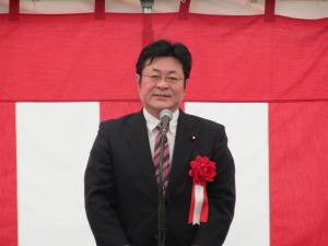 西村衆議院議員の祝辞の写真です。